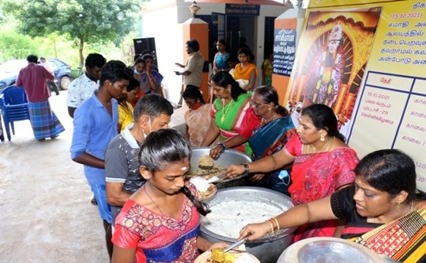 Volunteers serving food